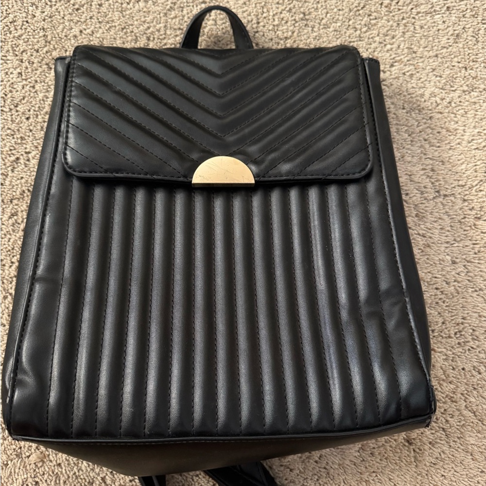 Black Quilted Backpack with Gold Accent